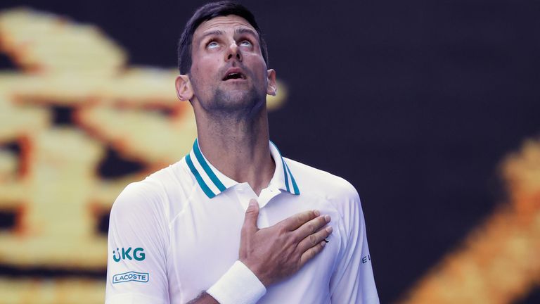 Novak Djokovic celebrates after defeating United States' Frances Tiafoe in their second round match at the Australian Open tennis championship in Melbourne, Australia, Wednesday, Feb. 10, 2021.(AP Photo/Rick Rycroft)