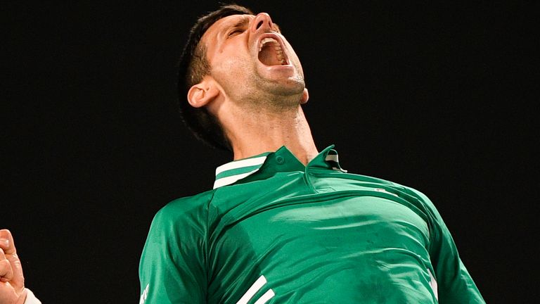 Serbia's Novak Djokovic celebrates after defeating United States' Talyor Fritz in their third round match at the Australian Open tennis championship in Melbourne, Australia, Saturday, Feb. 13, 2021.(AP Photo/Andy Brownbill)