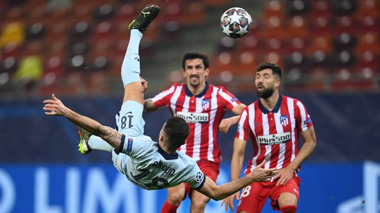 Olivier Giroud scores with an overhead kick against Atletico Madrid