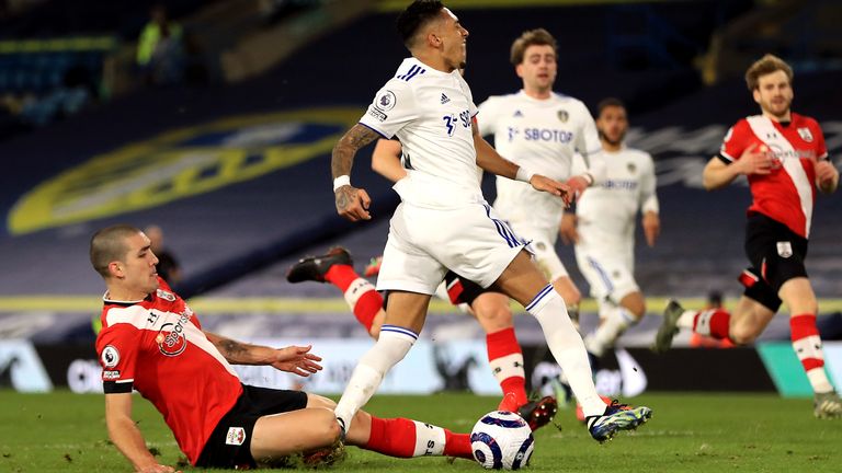 Southampton&#39;s Oriol Romeu (left) tackles Leeds United&#39;s Raphinha