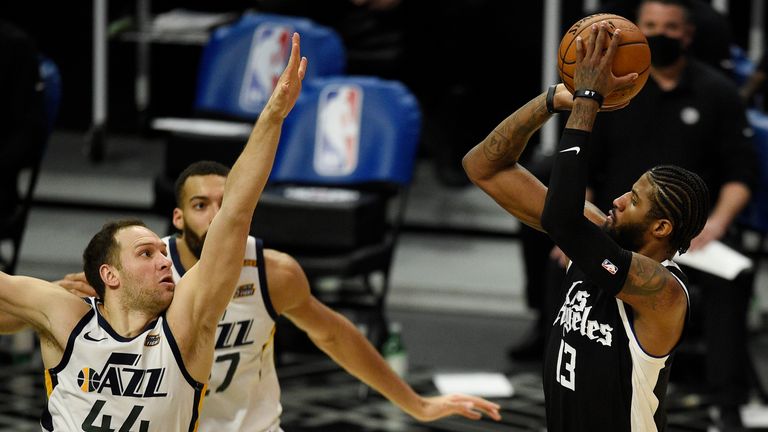Los Angeles Clippers guard Paul George shoots against the Utah Jazz