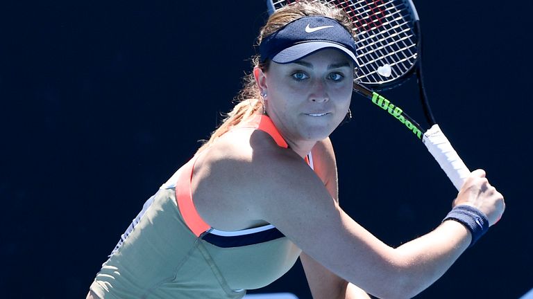 Spain's Paula Badosa makes a backhand return to Russia's Liudmila Samsonova during their first round match at the Australian Open tennis championship in Melbourne, Australia, Tuesday, Feb. 9, 2021.(AP Photo/Andy Brownbill)