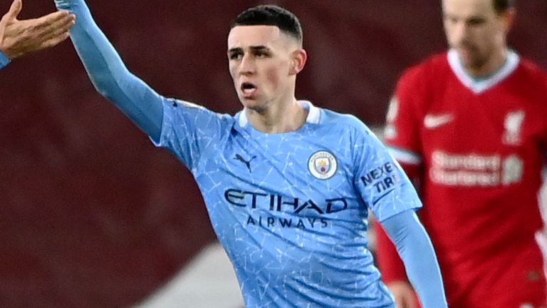 Phil Foden celebrates a goal against Liverpool