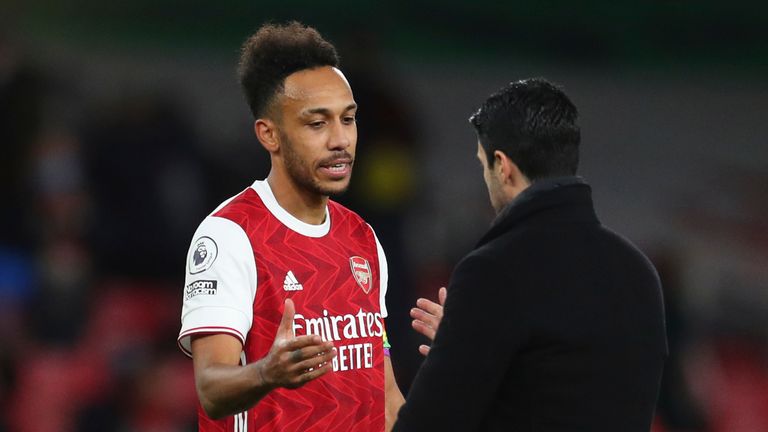 AP - Pierre-Emerick Aubameyang with manager Mikel Arteta