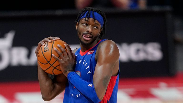 Detroit Pistons forward Jerami Grant holds on to the ball in the closing seconds of the second half of an NBA basketball game against the Brooklyn Nets, Tuesday, Feb. 9, 2021, in Detroit.