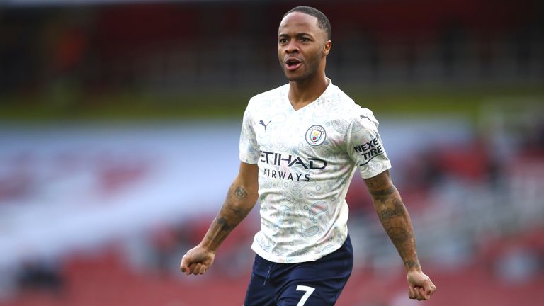 Raheem Sterling celebrates after scoring two minutes into the first half against Arsenal (AP)