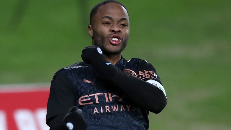 Raheem Sterling celebrates putting Manchester City 2-0 up at Swansea