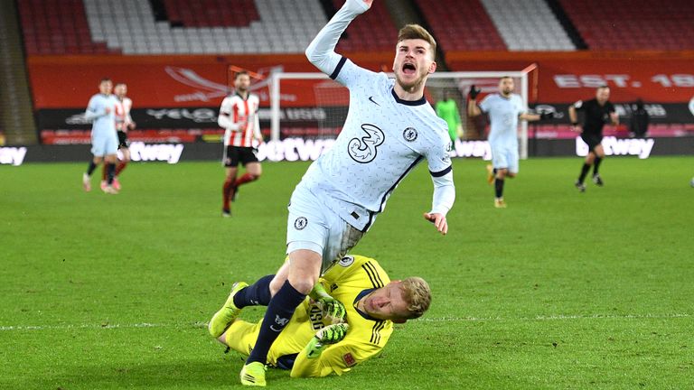 Sheffield United goalkeeper Aaron Ramsdale (right) fouls Chelsea&#39;s Timo Werner which results in a penalty kick after a VAR check during the Premier League match at Bramall Lane, Sheffield. Picture date: Sunday February 7, 2021.