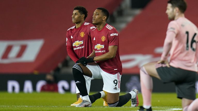 Marcus Rashford (L), Anthony Martial (C) and Manchester United team-mate Axel Tuanzebe were among the players subjected to racist abuse online last week