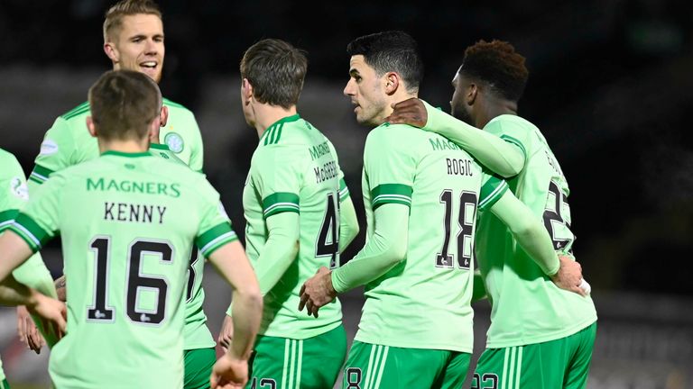 Celtic's Tom Rogic (centre) celebrates making it 1-0