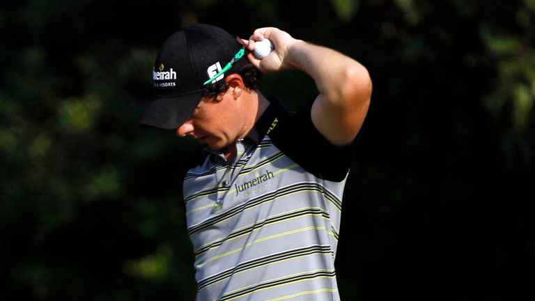 Rory McIlroy of Northern Ireland walks off the 11th hole after a bogey during the final round of the Masters golf tournament Sunday, April 10, 2011, in Augusta, Ga. 