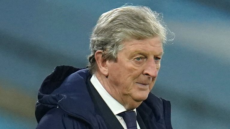 Crystal Palace&#39;s manager Roy Hodgson, left, looks on near Manchester City&#39;s head coach Pep Guardiola during an English Premier League soccer match between Manchester City and Crystal Palace at the Etihad Stadium in Manchester, England, Sunday Jan.17, 2021.