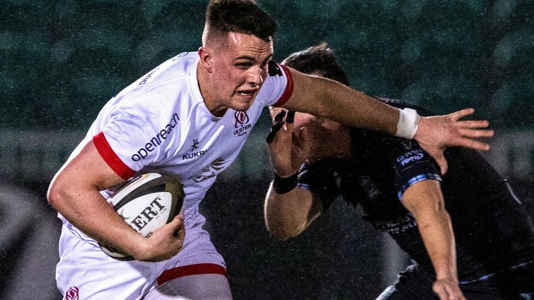 James Hume of Ulster evades the tackle from Sam Johnson of Glasgow Warriors