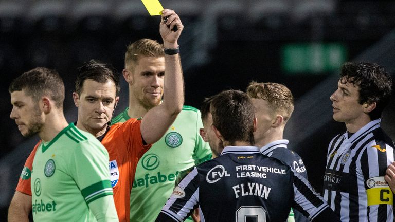 St Mirren&#39;s Ryan Flynn was booked for a challenge on Greg Taylor, which led to a Celtic penalty