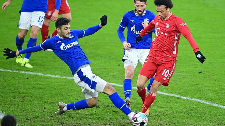 Ozan Kabak tackles Leroy Sane - AP Images