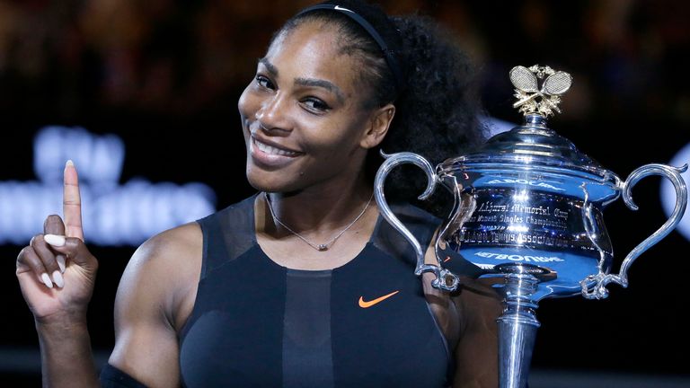 Serena Williams holds up a finger and her trophy after defeating her sister, Venus, in the women's singles final at the Australian Open tennis championships in Melbourne, Australia. Williams, defending champion has withdrawn from the 2018 Australian Open, saying she is not ready to return to tournament tennis. (AP Photo/Aaron Favila, File)