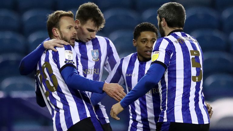 Sheffield Wednesday's Jordan Rhodes (left) celebrates his goal against Wycombe with team-mates