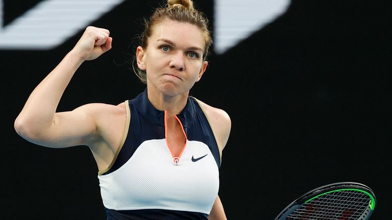 Romania's Simona Halep reacts after winning a point against Australia's Lizette Cabrera during their first round match at the Australian Open tennis championship in Melbourne, Australia, Monday, Feb. 8, 2021.(AP Photo/Rick Rycroft)