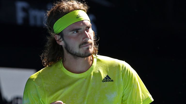 Greece's Stefanos Tsitsipas celebrates winning a point against Sweden's Mikael Ymer during their third round match at the Australian Open tennis championships in Melbourne, Australia, Saturday, Feb. 13, 2021. (AP Photo/Hamish Blair)