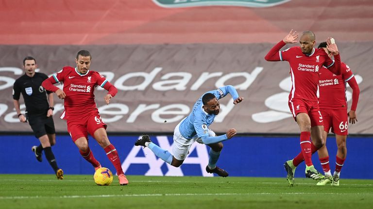 Manchester City were awarded a penalty at Anfield after Raheem Sterling was tripped in the box by Fabinho