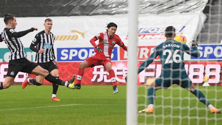 Takumi Minamino pulls a goal back for Southampton (AP)