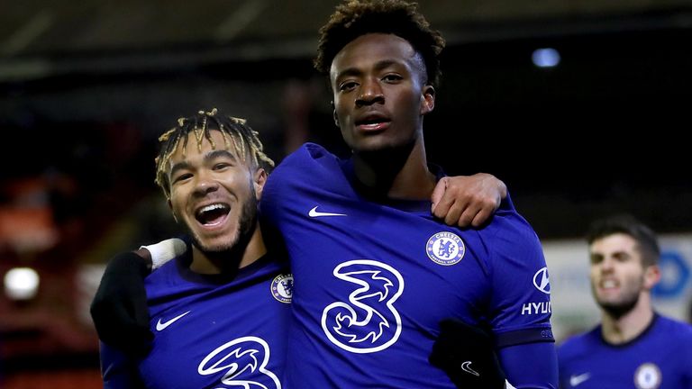 Tammy Abraham celebrates with Reece James after putting Chelsea ahead against Barnsley in the FA Cup fifth round