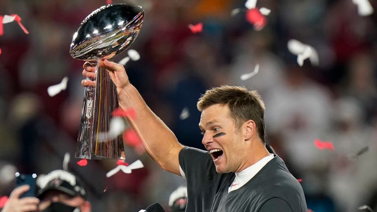 Tampa Bay Buccaneers quarterback Tom Brady celebrates with the Vince Lombardi Trophy at Super Bowl LV (AP Photo/Lynne Sladky)