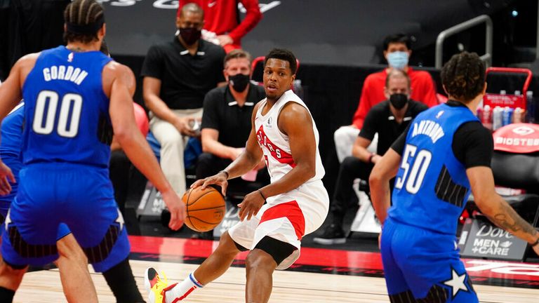 AP - Toronto Raptors guard Kyle Lowry (7) looks to pass against the Orlando Magic 