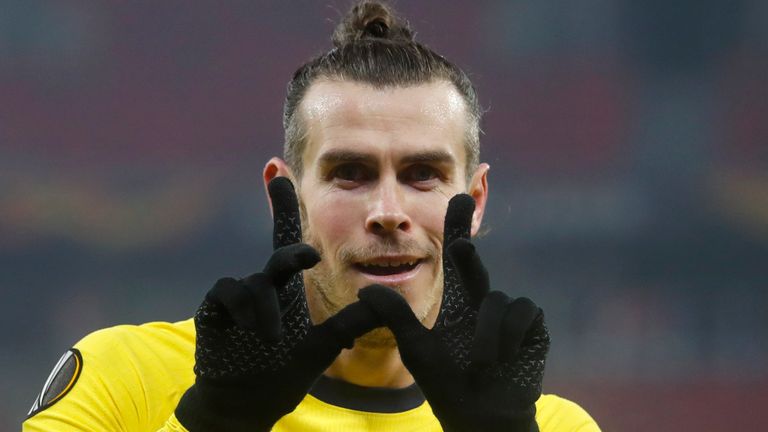 Gareth Bale celebrates his brilliant strike in the first-half in Budapest