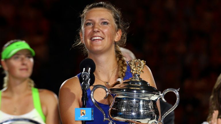 Victoria Azarenka of Belarus, center, delivers a speech in front of runner-up Maria Sharapova of Russia, left, and former champion Martina Hingis, right during the awarding ceremony, after Azarenka won their women's singles final at the Australian Open tennis championship, in Melbourne, Australia, Saturday, Jan. 28, 2012. (AP Photo/Rick Rycroft)
