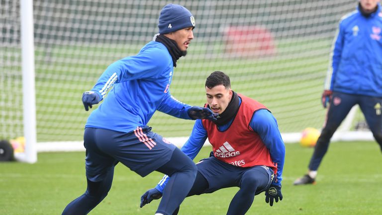 William Saliba in Arsenal training with Gabriel Martinelli