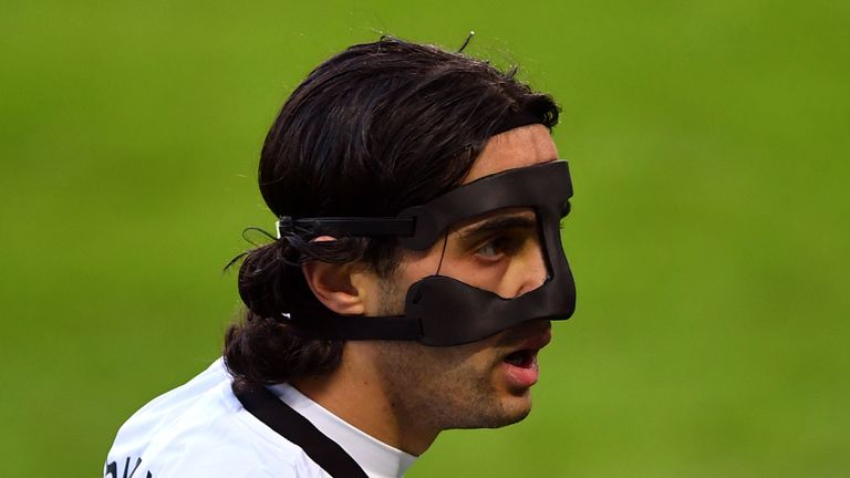 Swansea City&#39;s Yan Dhanda sports a protective mask during the Emirates FA Cup fourth round match at the Liberty Stadium, Swansea. Picture date: Saturday January 23, 2021