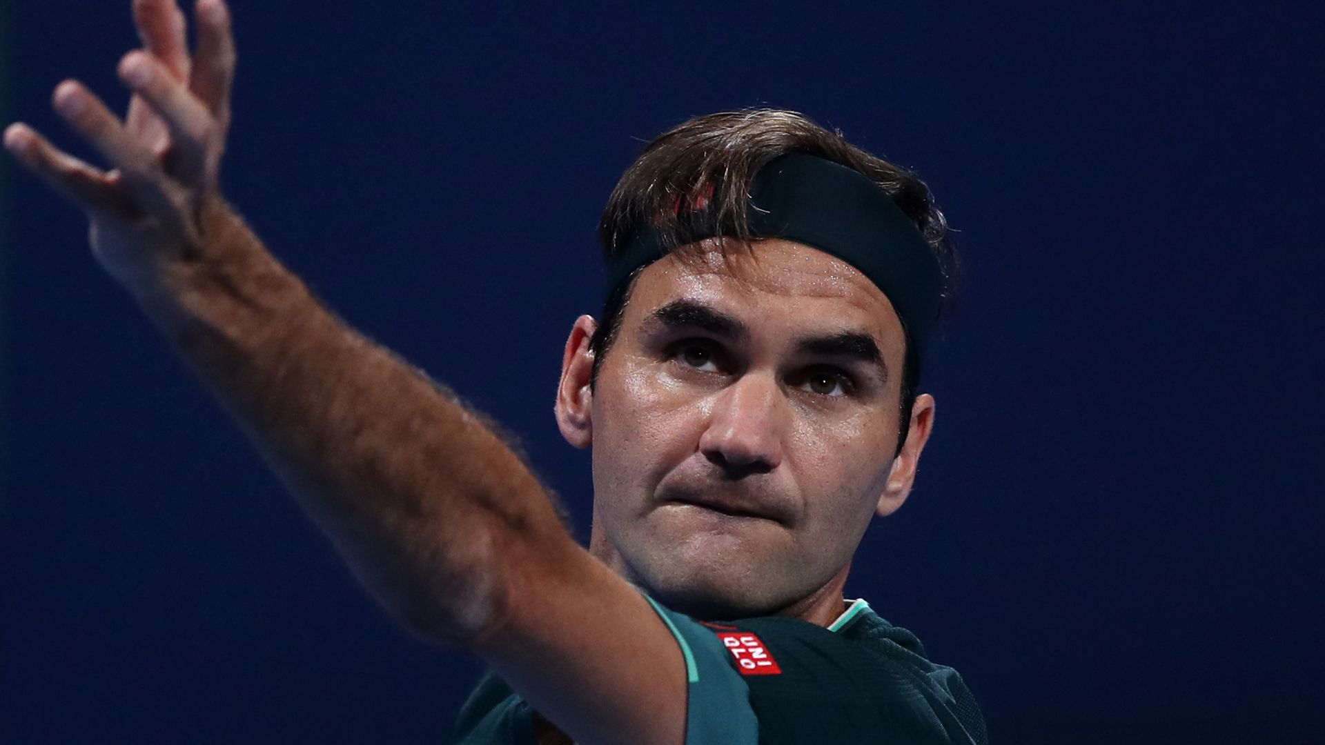 Federer sees off Evans to seal winning return