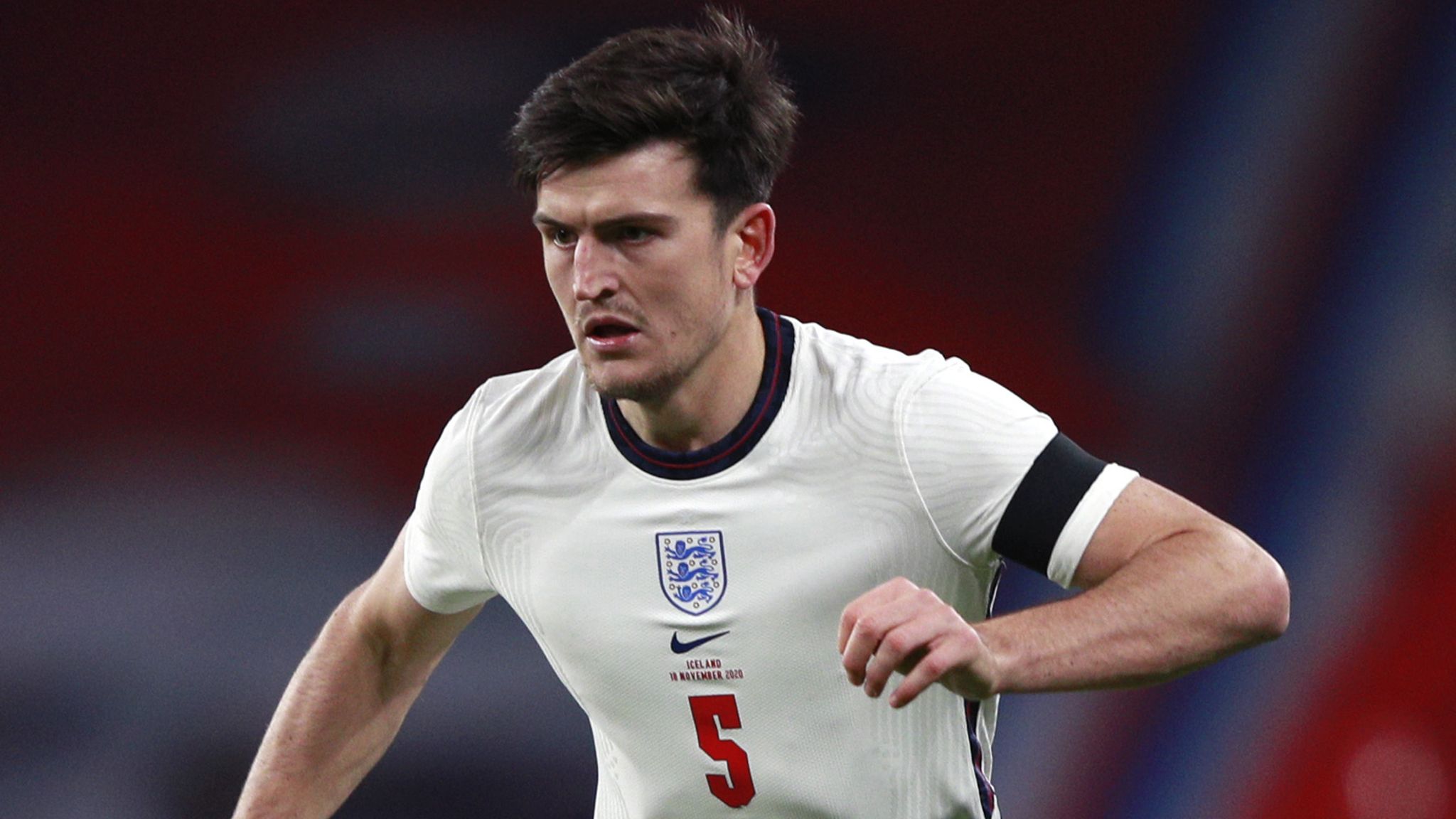  A photo of English footballer Harry Maguire playing for the England national team. Maguire is one of the defenders called up by Gareth Southgate for the England squad. Other defenders include John Stones, Marc Guehi, Lewis Dunk, Joe Gomez, Jarrad Branthwaite and Ezri Konsa.