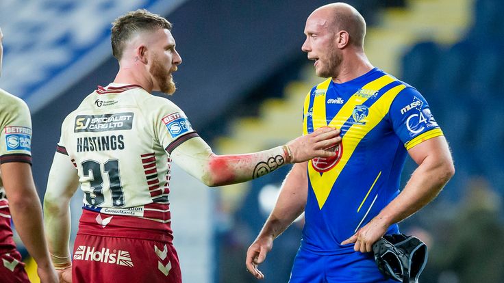 Picture by Allan McKenzie/SWpix.com - 09/10/2020 - Rugby League - Betfred Super League - Warrington Wolves v Wigan Warriors - Emerald Headingley Stadium, Leeds, England - Wigan's Jackson Hastings and Warrington's Chris Hill after their match.