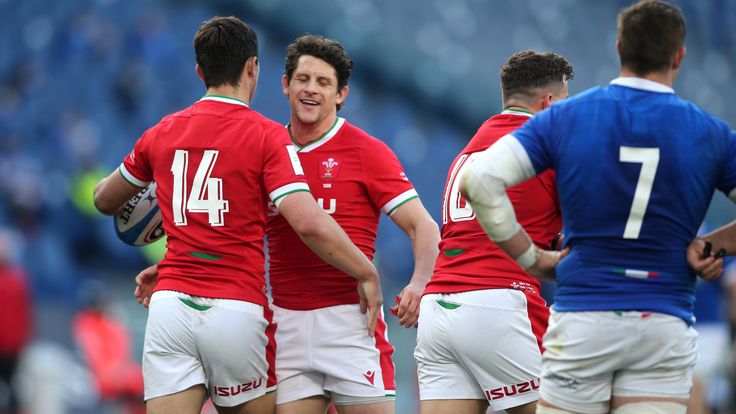 PA - Wales' Louis Rees-Zammit (left) celebrates scoring their seventh try against Italy with teammate Lloyd Williams