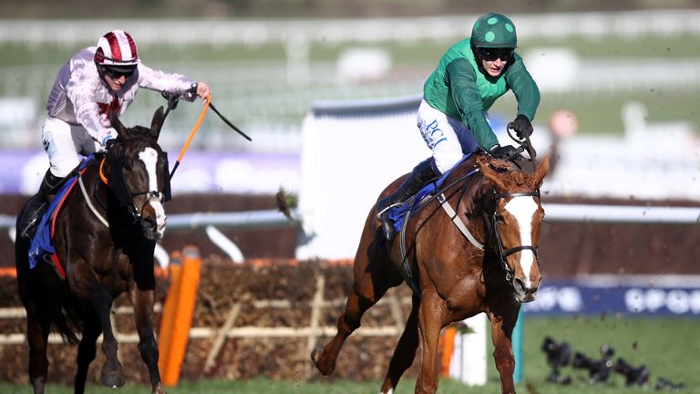 Black Tears ridden by Jack Kennedy (left) alongside Concertista ridden by Paul Townend (right) on their way to winning the Close Brothers Mares' Hurdle during day one of the Cheltenham Festival at Cheltenham Racecourse. Picture date: Tuesday March 16, 2021.