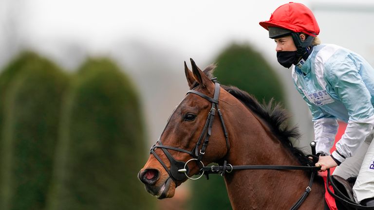 SUNBURY, ENGLAND - MARCH 20: Bridget Andrews riding Marracudja have a 'walk over' in the first race of the day as they are the only declared runner in The Virgin Bet Silver Bowl Handicap Chase at Kempton Park Racecourse on March 20, 2021 in Sunbury, England. Sporting venues around the UK remain under strict restrictions due to the Coronavirus Pandemic as Government social distancing laws prohibit spectators inside venues resulting in events being held behind closed doors. (Photo by Alan Crowhurst/Getty Images)
