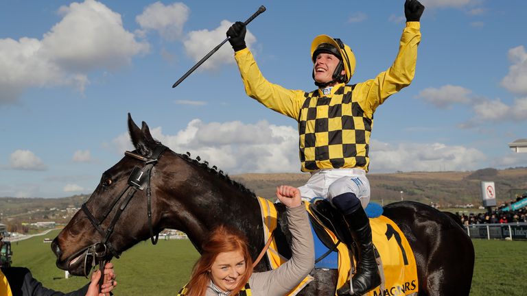 Paul Townend celebrates victory on Al Boum Photo after they won the Gold Cup during day four of the Cheltenham Festival last March