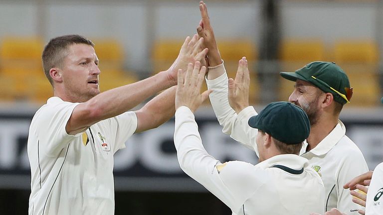 AP Newsroom - Australia's Jackson Bird celebrates with his team after getting the wicket of Pakistan's Misbah Ul Haq, not shown, during play on day four of the first cricket test between Australia and Pakistan in Brisbane, Australia, Sunday, Dec. 18, 2016. (AP Photo/Tertius Pickard)
