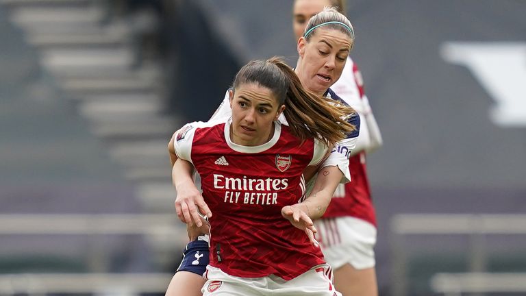 Arsenal's Danielle van de Donk (front) and Tottenham Hotspur's Alanna Kennedy battle for the ball