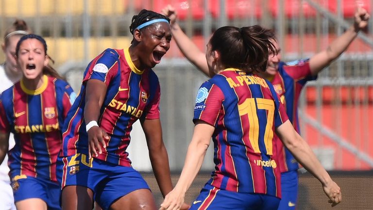 Barcelona's Asisat Oshoala (centre) celebrates with team-mates after scoring against Man City in Women's Champions League