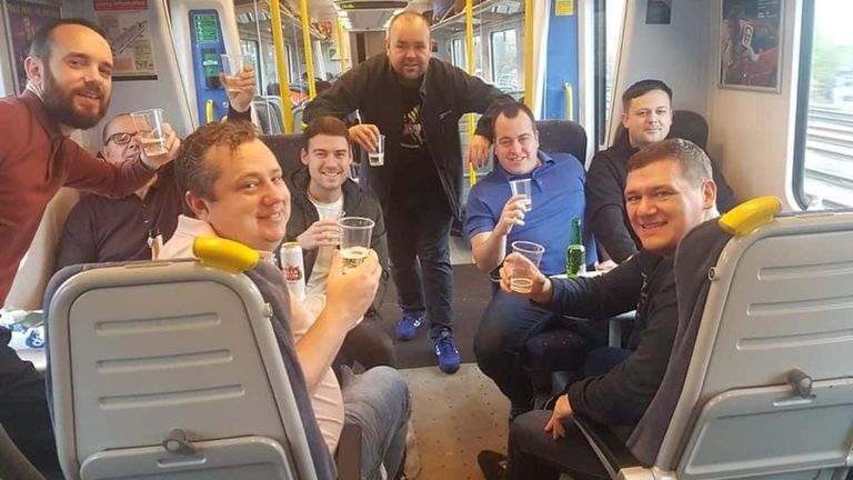 Liverpool fans on the train to an away game