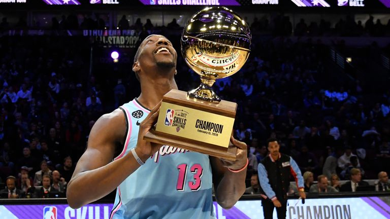 Miami Heat&#39;s Bam Adebayo holds the trophy after winning NBA basketball&#39;s All-Star Skills Challenge