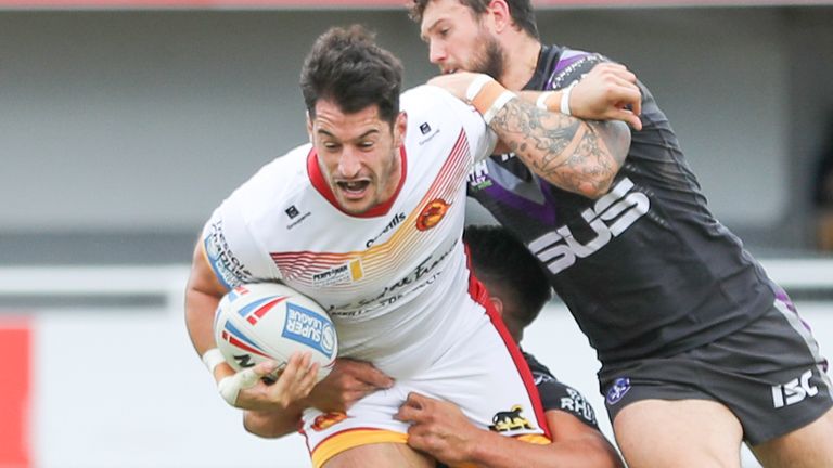 Picture by Laurent Selles/Catalan Dragons/SWpix.com - 04/10/20 - Rugby League - Betfred Super League - Catalan Dragons v Wakefield Wildcats - Stade Gilbert Brutus, Perpignon, France - Catalans's Benjamin Garcia is tackled by Wakefield's Jay Pitts.