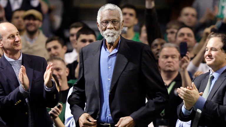 Former Boston Celtic Bill Russell receives a standing ovation after being introduced prior to the Celtics&#39; NBA basketball game against the Detroit Pistons