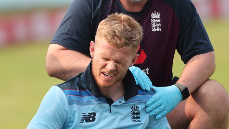 AP - Sam Billings receives treatment during the first one-day international against India
