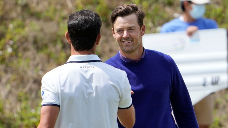 Billy Horschel, left, is congratulated by Victor Perez, of France, on the No. 16 green after Horschel won their semifinal round match at the Dell Technologies Match Play Championship