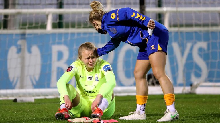 Birmingham City goalkeeper Hannah Hampton (left) is comforted by Everton's Izzy Christiansen at the end of the FA Women's Super League match