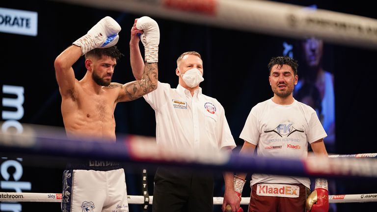 *** FREE FOR EDITORIAL USE ***.Joe Cordina vs Faroukh Kourbanov, Super Featherweight Contest, SSE Wembley Arena..20 March 2021.Picture By Dave Thompson Matchroom Boxing. .Joe Cordina declared winner and celebrates. 